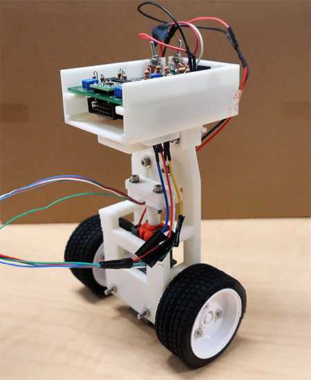 Magnetic encoders support the stabilisation control of a self-balancing two-wheeled robotic vehicle